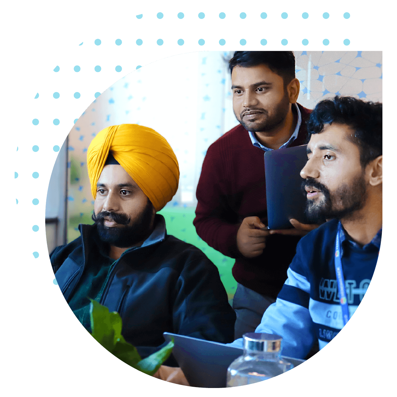 Three professionals engaged in a meeting, representing a collaborative consultation focused on data intelligence 